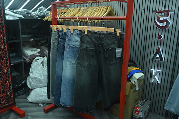 Tee wall display at SADAK store